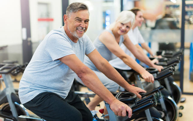 seniors are cycling during their lower body cardio exercises routine